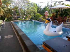 Отель SunwuKong Guest House  Убуд